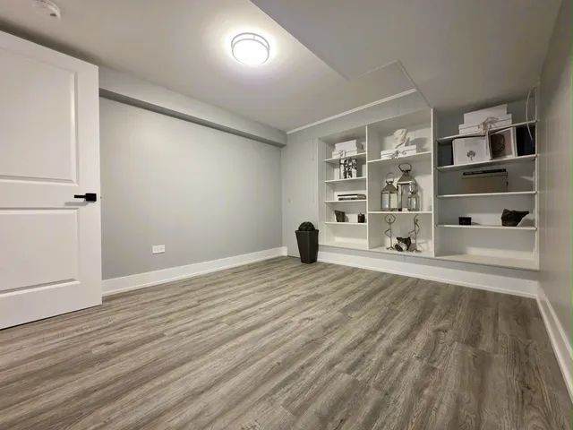 a view of a living room a room with furniture and a wooden floor