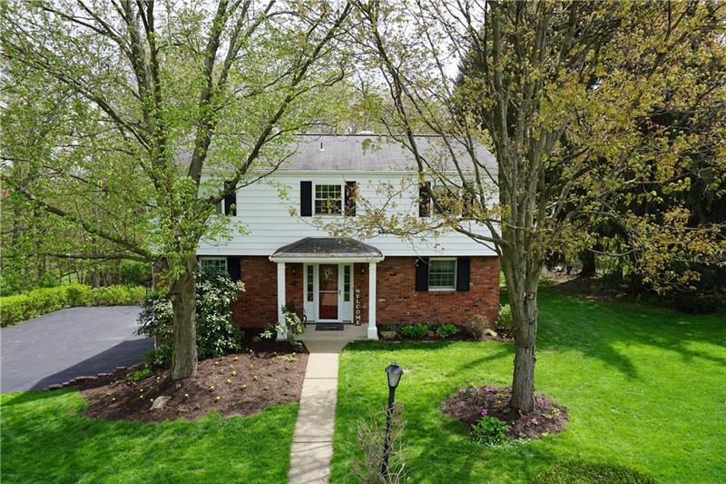Welcome to 4137 Ewalt Drive! Charming custom home nestled among trees and gorgeous landscaping. Freshly painted exterior and new asphalt creates a home perfect for anyone!
