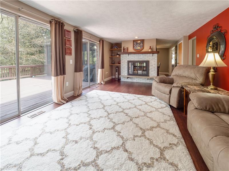 4137 Ewalt Road Gibsonia, PA 15044 - Photo 13 of 25 So much space in this room. Brings the outside in.