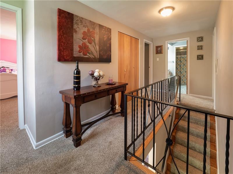 4137 Ewalt Road Gibsonia, PA 15044 - Photo 14 of 25 Oversized second floor hallway with fresh paint and new carpet.