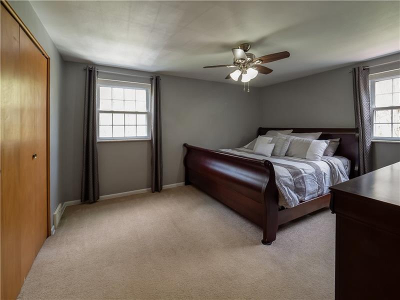 4137 Ewalt Road Gibsonia, PA 15044 - Photo 15 of 25 Master bedroom with modern paint. Charming bath attached.
