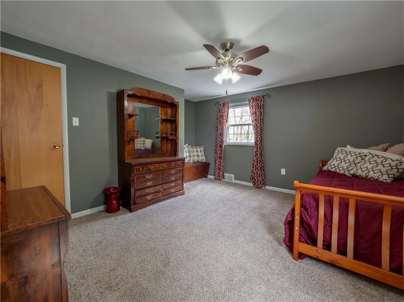 4137 Ewalt Road Gibsonia, PA 15044 - Photo 19 of 25 Another spacious bedroom with views of the woods.