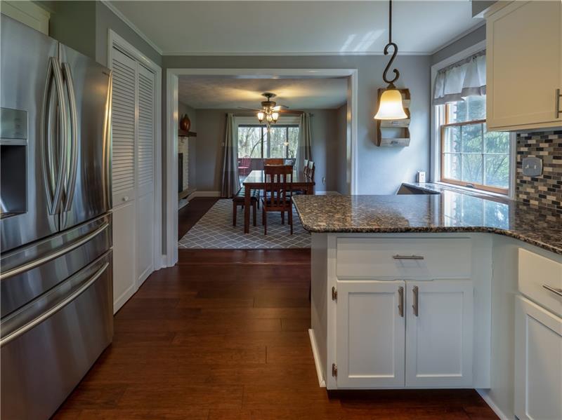 4137 Ewalt Road Gibsonia, PA 15044 - Photo 8 of 25 Open to oversized dining room with access to covered rear deck for extra living space.