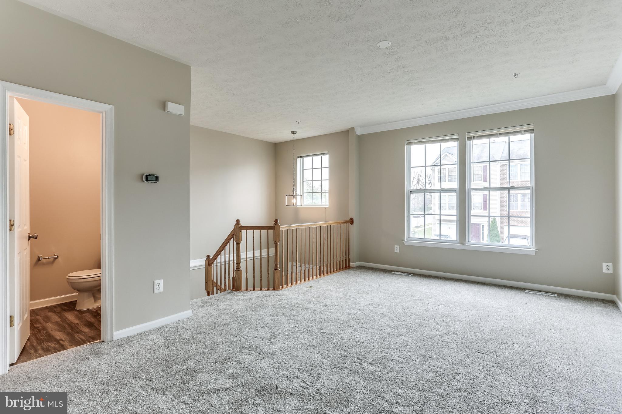 9817 Biggs Road Baltimore, MD 21220 - Photo 11 of 33 Living Room/Powder Room