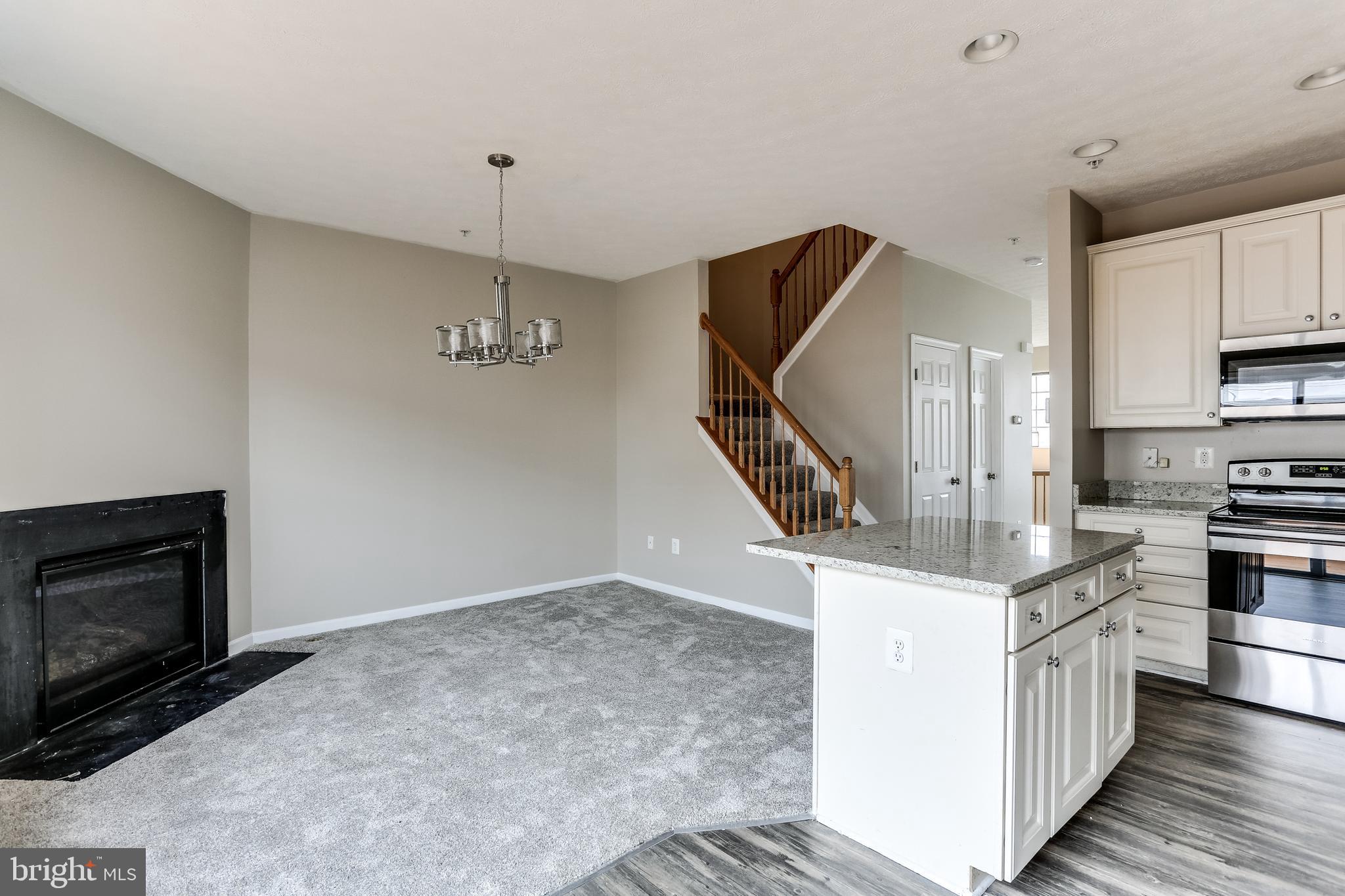 9817 Biggs Road Baltimore, MD 21220 - Photo 19 of 33 Kitchen / Dining Room w/FP