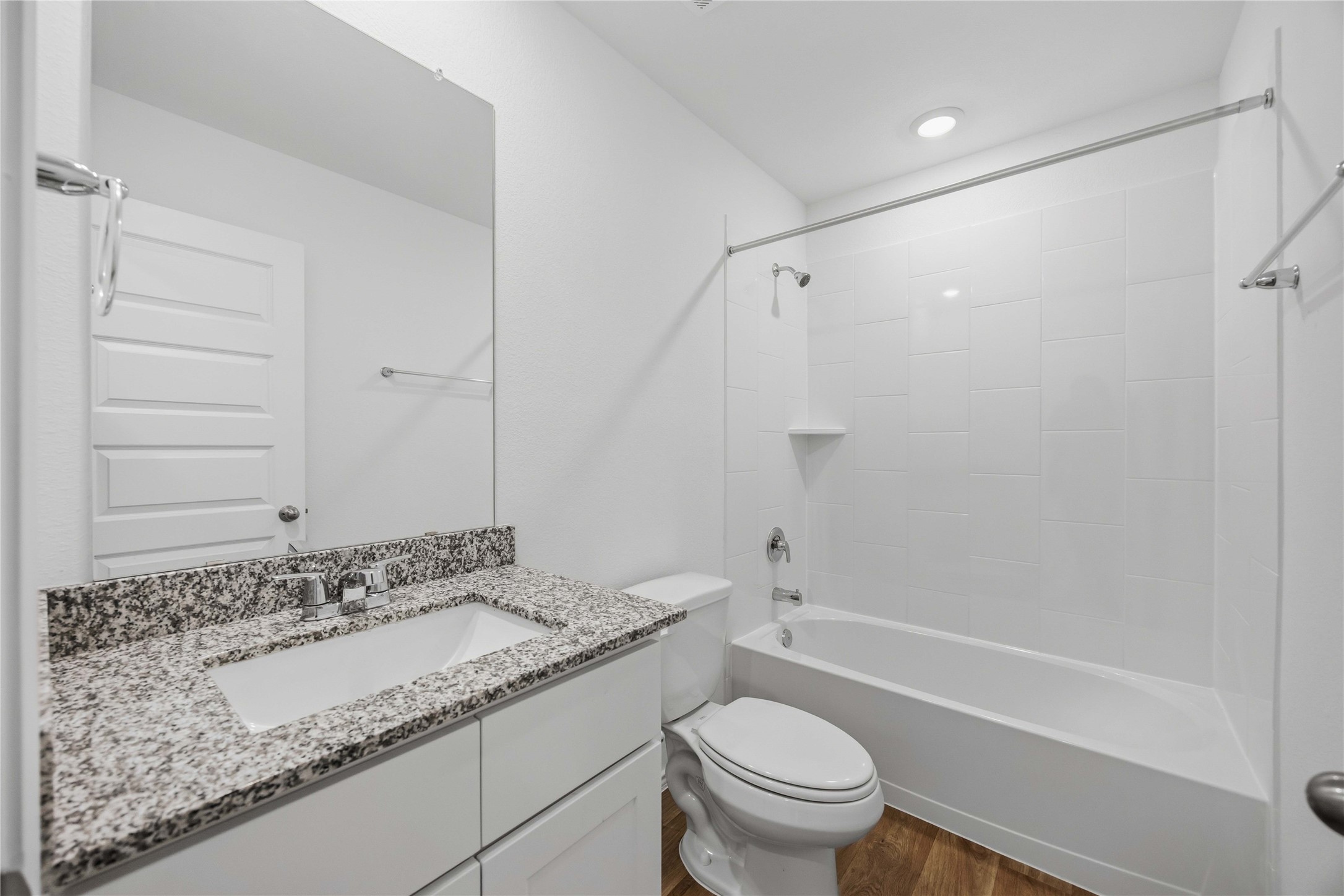 11913 Sweet Apple Lane Houston, TX 77048 - Photo 16 of 20 a bathroom with a granite countertop sink toilet and shower