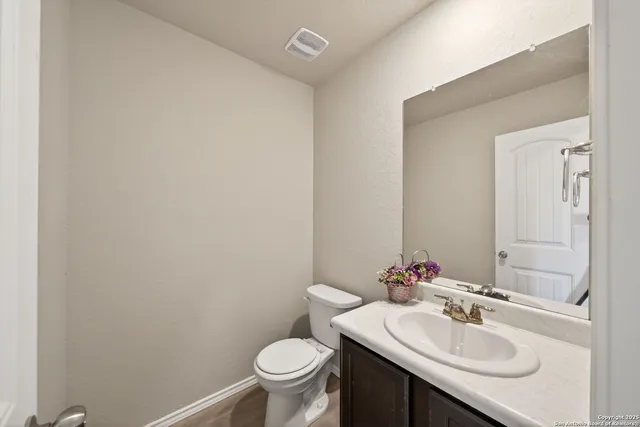 a bathroom with a sink and a toilet
