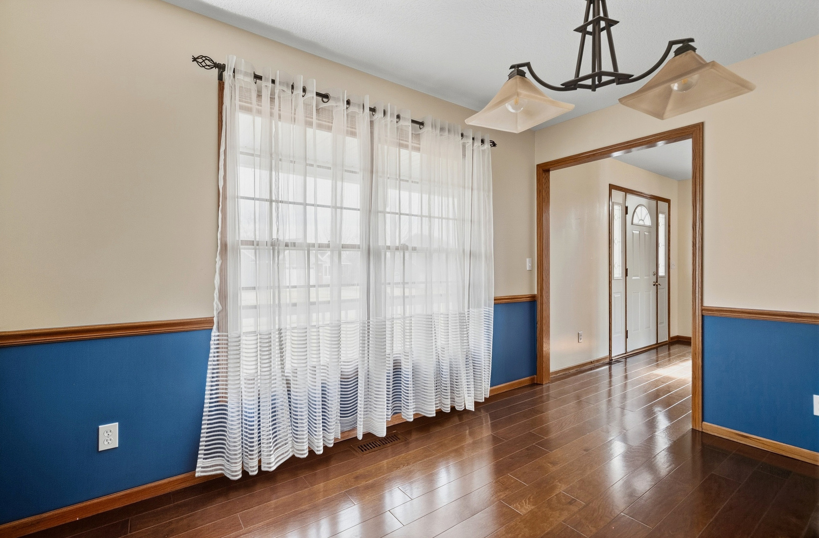 2052 Ashford Road Bettendorf, IA 52722 - Photo 12 of 40 a view of entryway with wooden floor