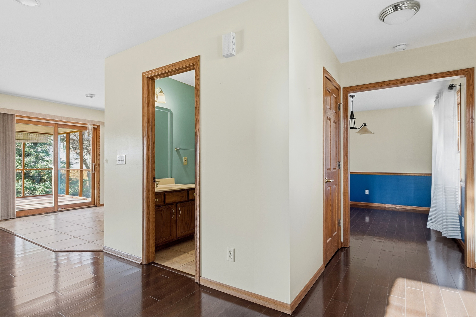 2052 Ashford Road Bettendorf, IA 52722 - Photo 13 of 40 wooden floor and windows in a room