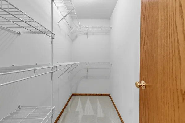 a view of a room with racks on the wall