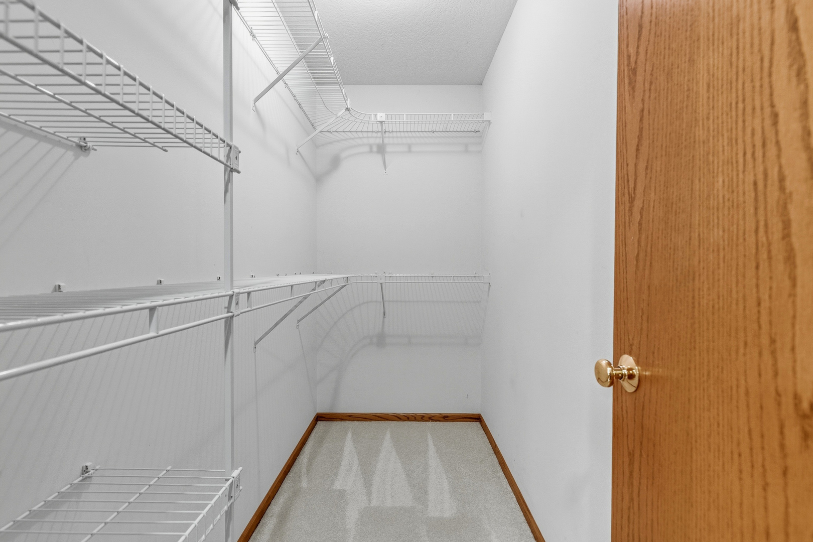 2052 Ashford Road Bettendorf, IA 52722 - Photo 30 of 40 a view of a room with racks on the wall