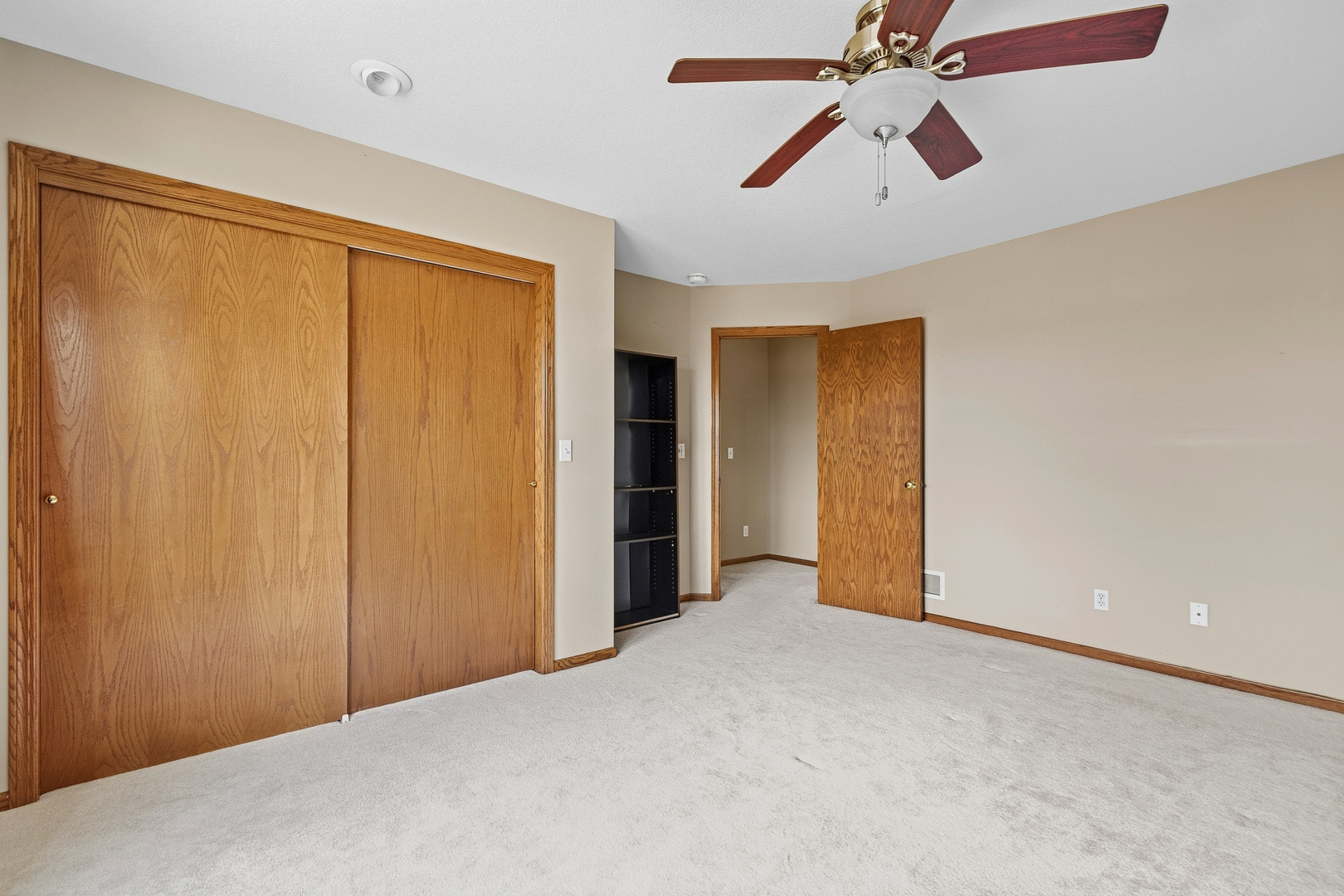 2052 Ashford Road Bettendorf, IA 52722 - Photo 32 of 40 a view of empty room with a ceiling fan and a ceiling fan