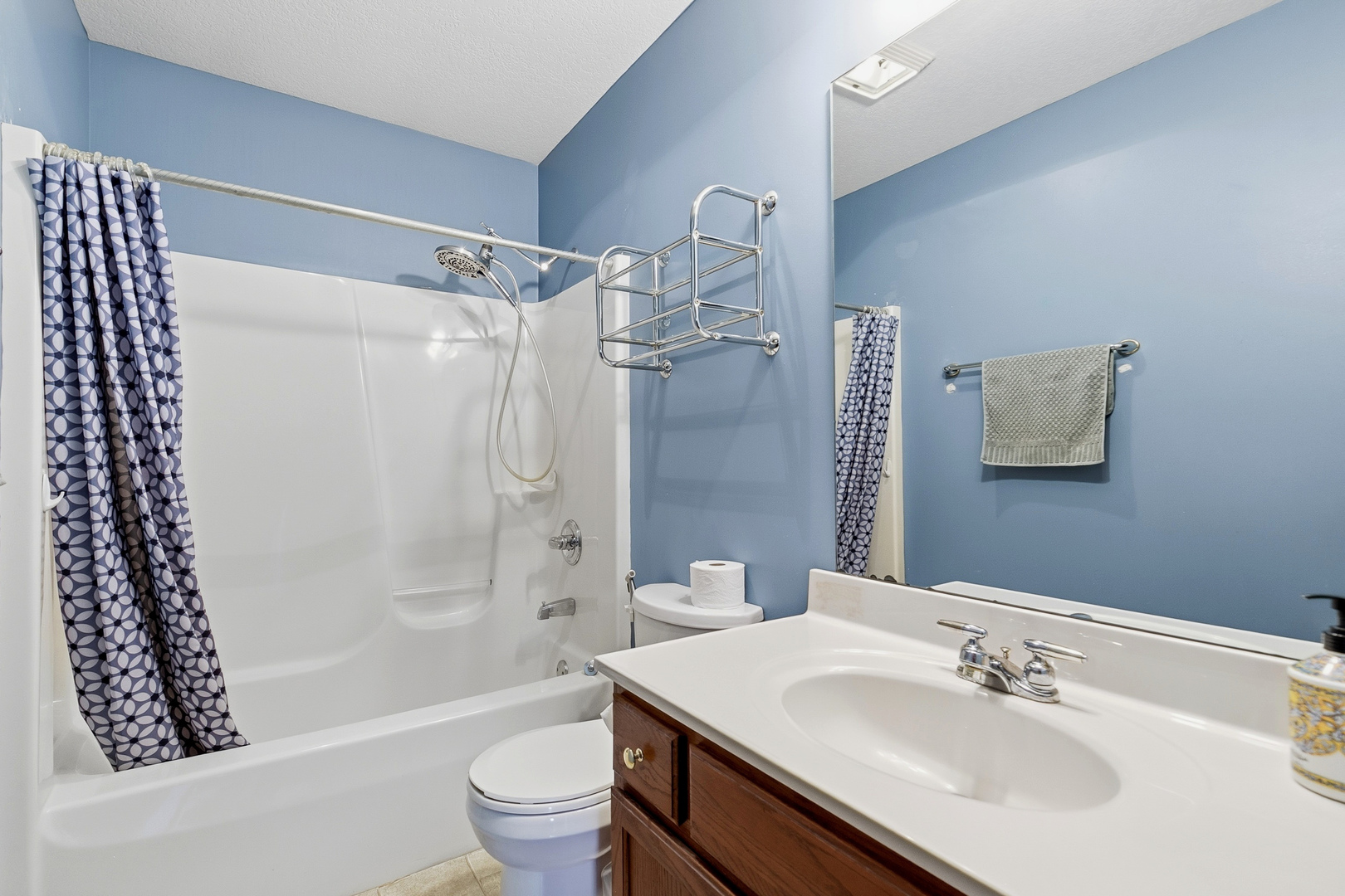 2052 Ashford Road Bettendorf, IA 52722 - Photo 33 of 40 a bathroom with a sink toilet and shower