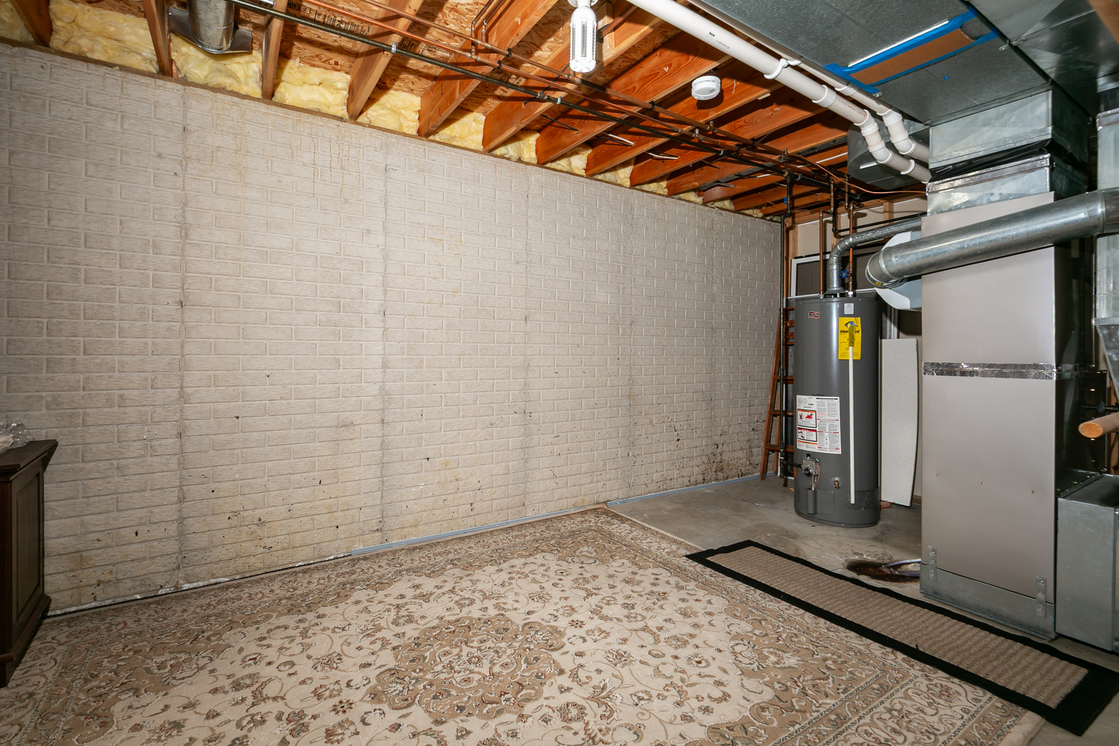2052 Ashford Road Bettendorf, IA 52722 - Photo 40 of 40 a view of a garage with wooden floor