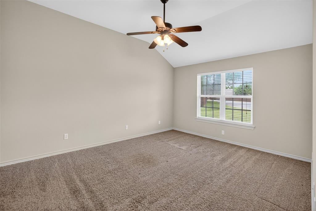 505 East 5th Street Springtown, TX 76082 - Photo 14 of 39 a view of an empty room with a window