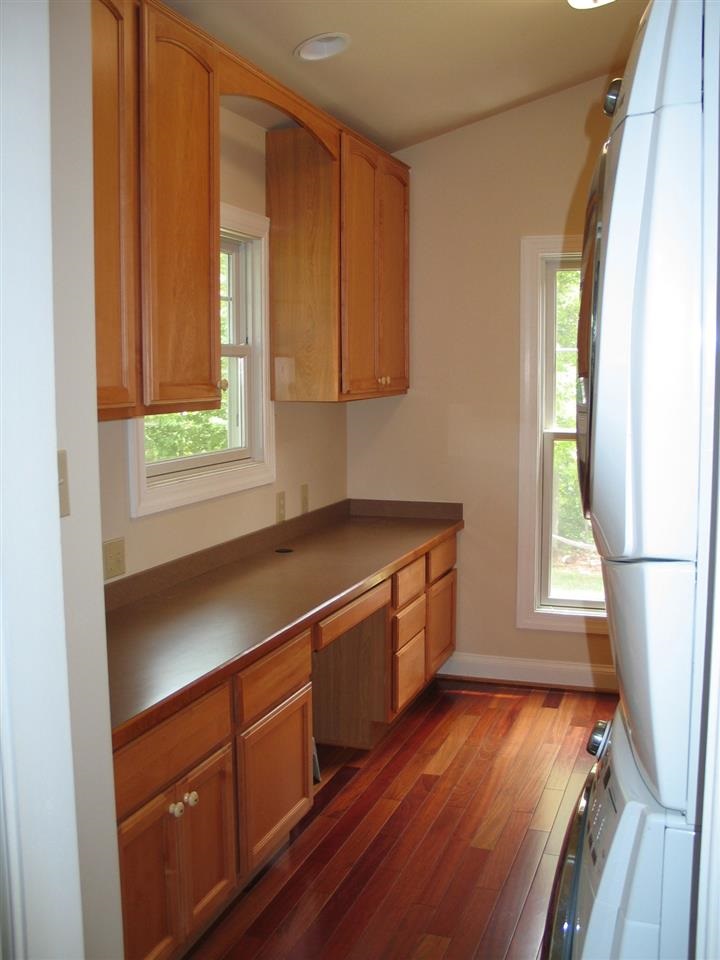 2864 Duet Road, Unit 2 Etlan, VA 22719 - Photo 8 of 25 a view of a kitchen with wooden floor and electronic appliances