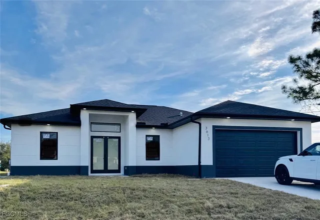 a house with trees in front of it
