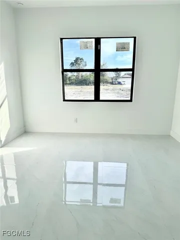 a room with a white wall