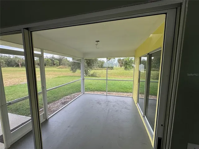 a view of a room with an outdoor space