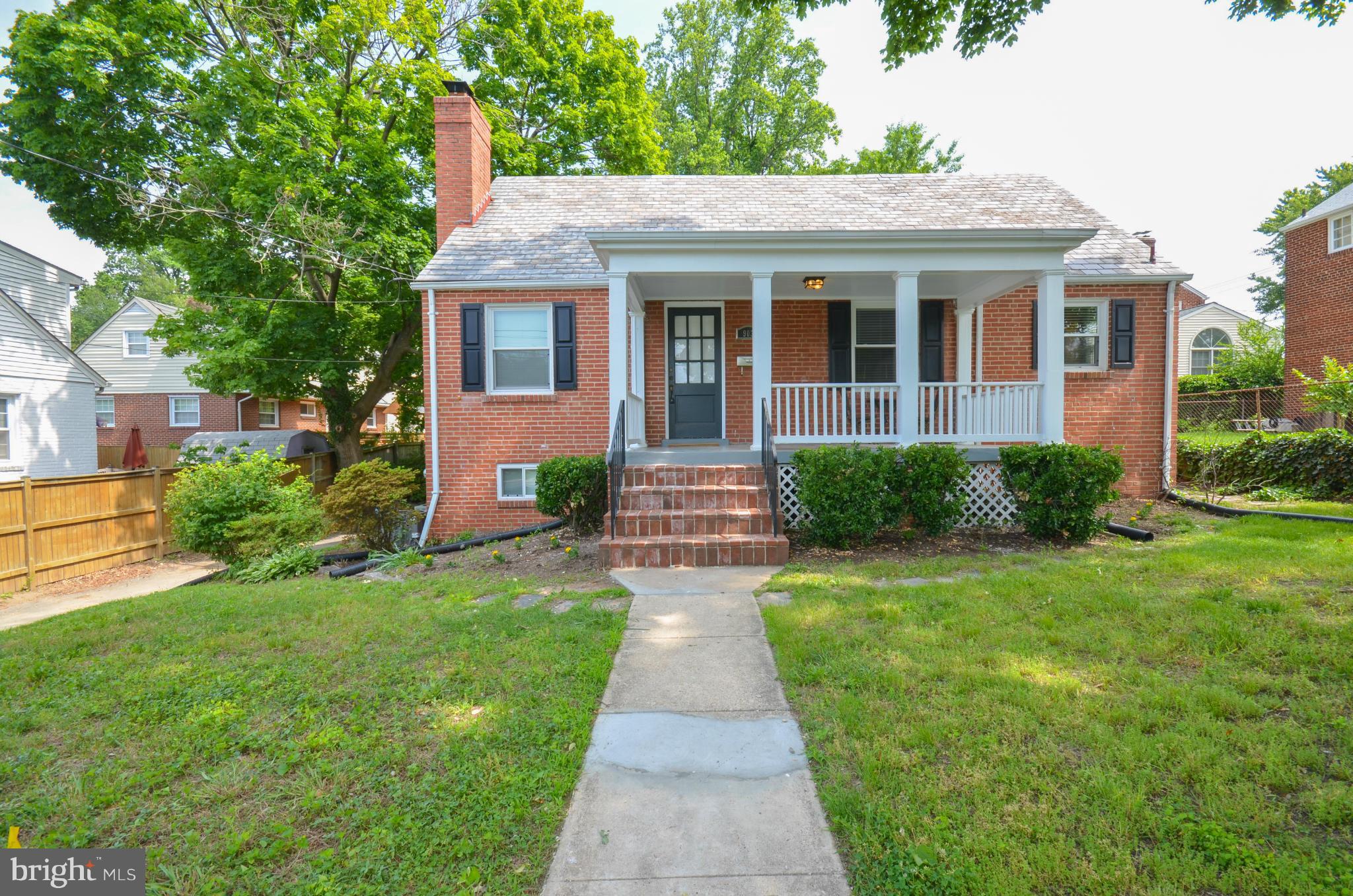 903 Forest Glen Road Silver Spring, MD 20901 - Photo 1 of 30 a front view of a house with garden