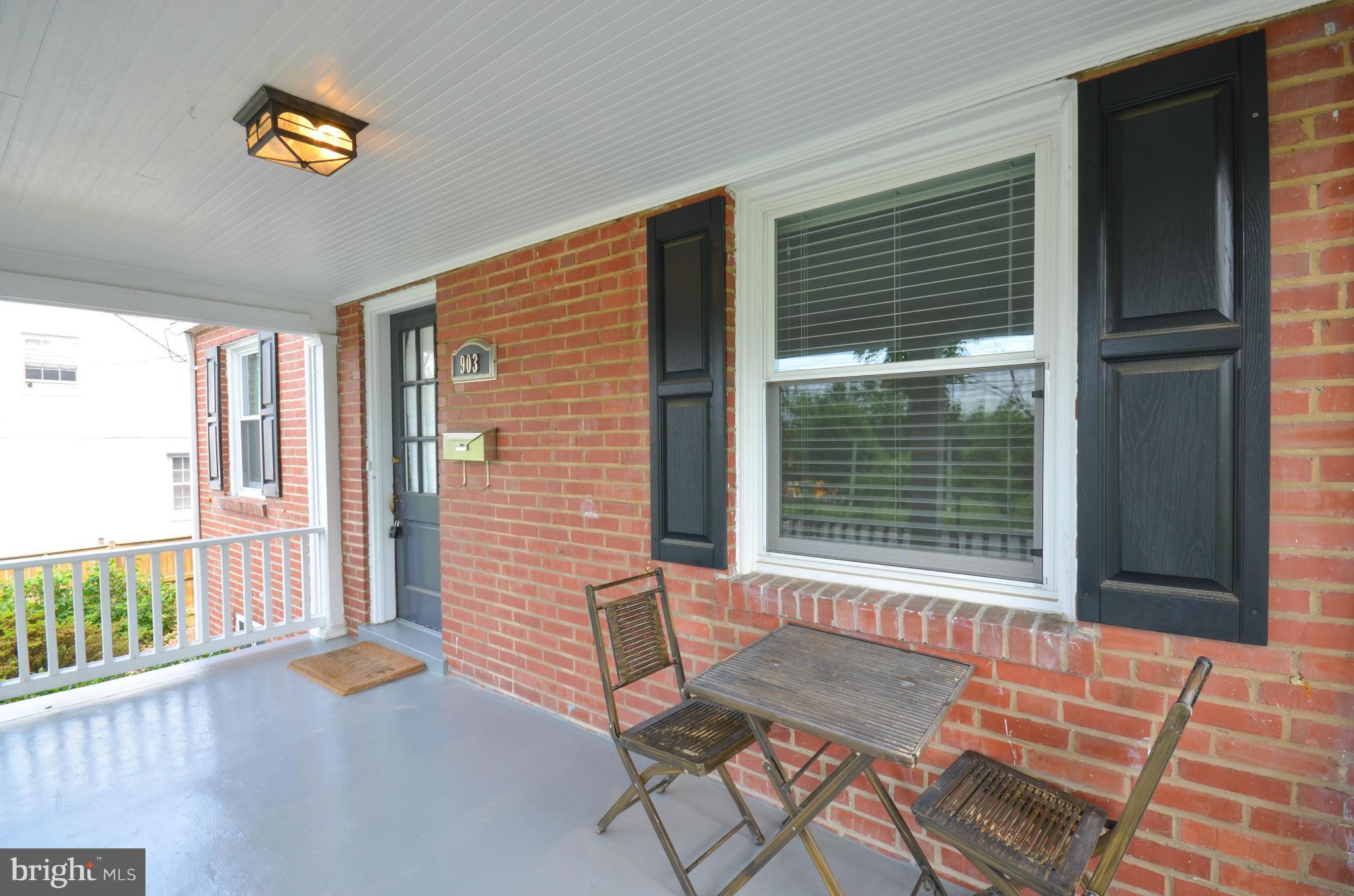 903 Forest Glen Road Silver Spring, MD 20901 - Photo 3 of 30 a view of a lounge chairs in the porch