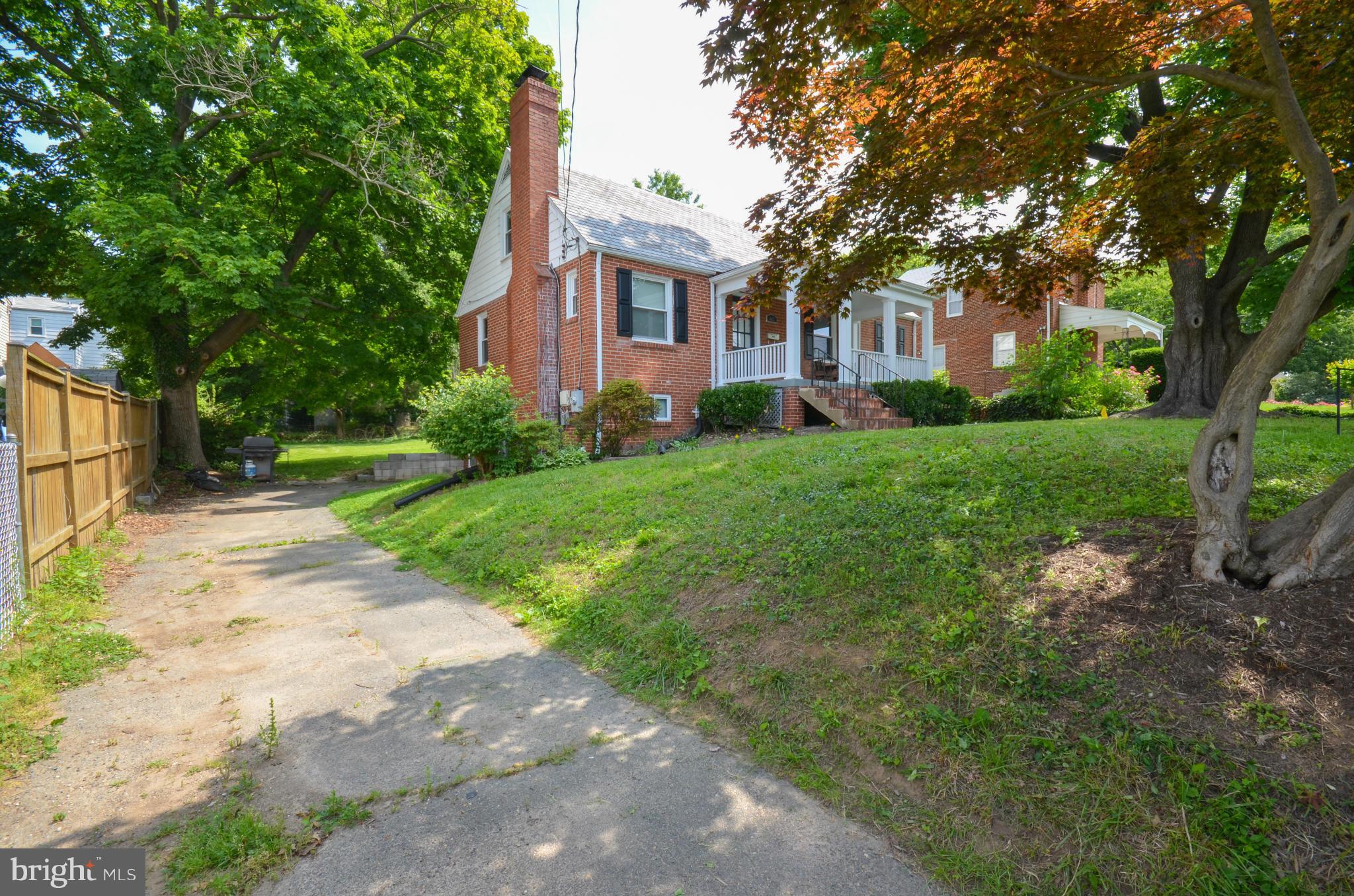 903 Forest Glen Road Silver Spring, MD 20901 - Photo 4 of 30 a view of a house with a yard