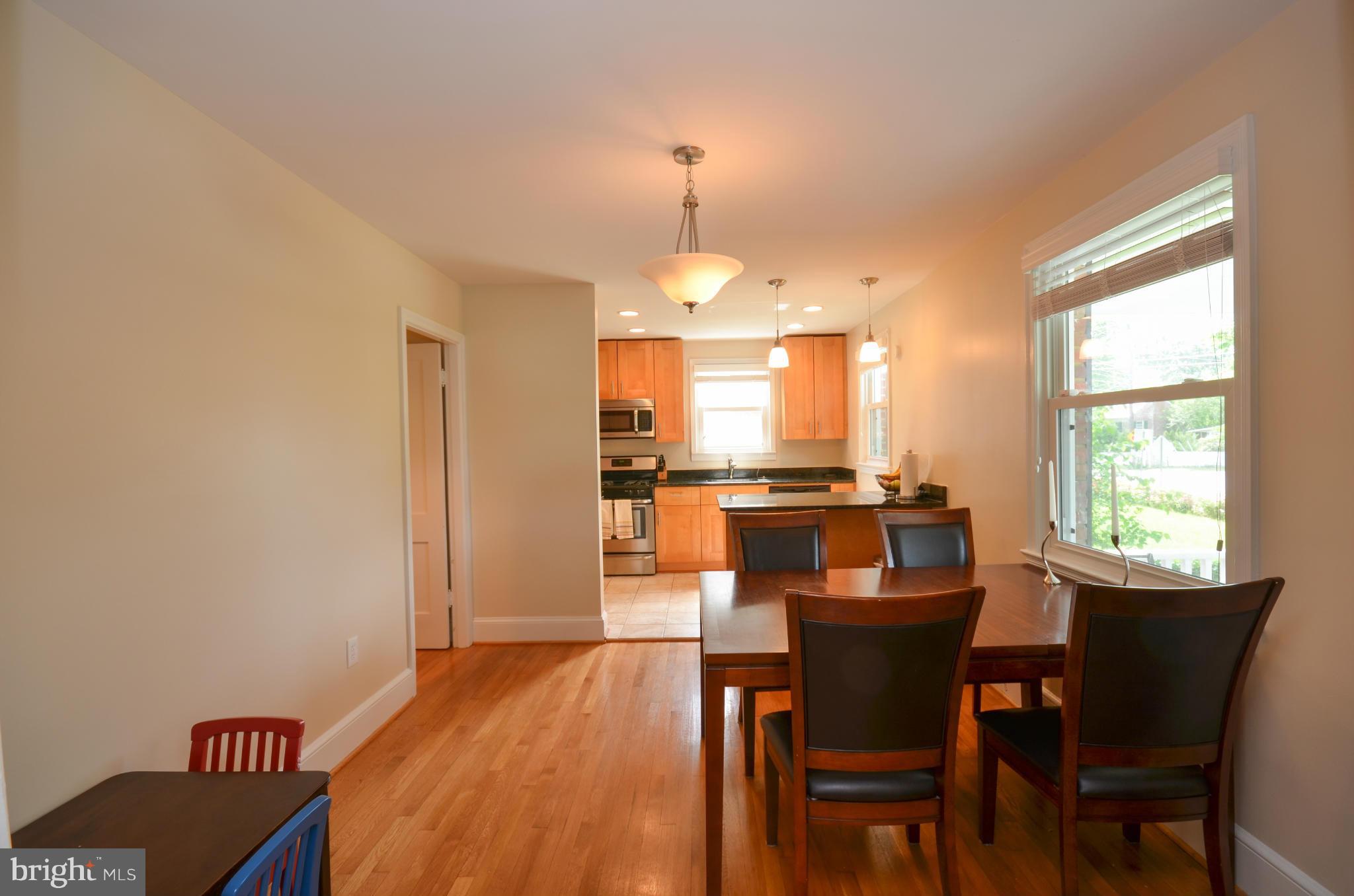 903 Forest Glen Road Silver Spring, MD 20901 - Photo 7 of 30 a dining room with furniture and window