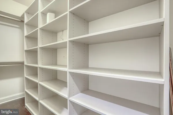 a view of an empty walk in closet