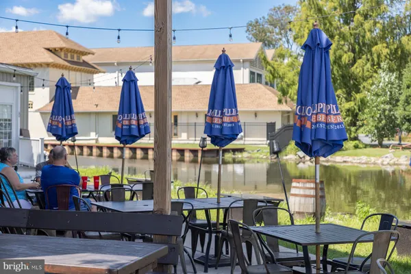 a view of dinning table and chairs in the patio