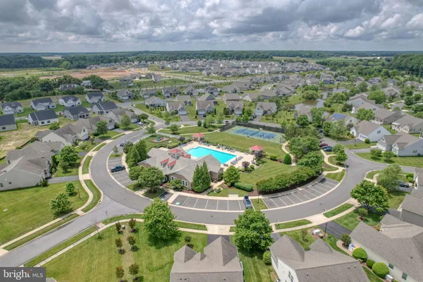 an aerial view of a house with a garden