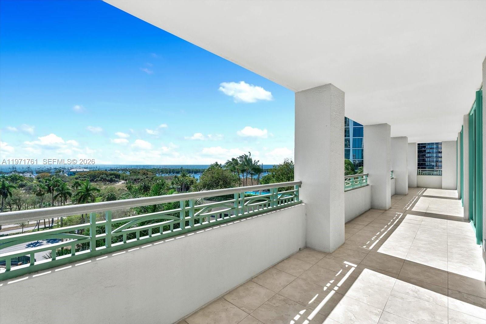 3400 Southwest 27th Avenue, Unit 602 Miami, FL 33133 - Photo 6 of 42 a view of a balcony with city view