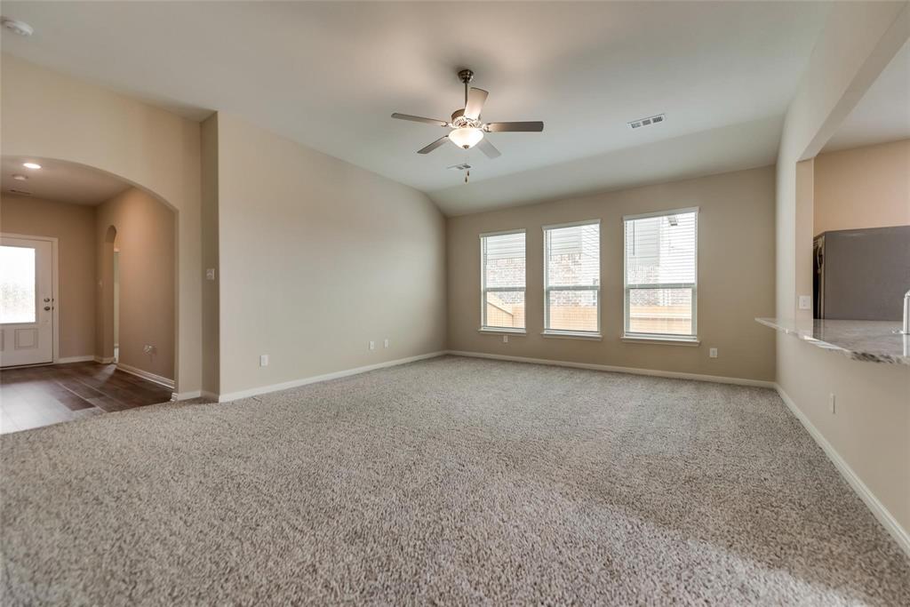 291 Wandering Stream Way Princeton, TX 75407 - Photo 4 of 22 a view of an empty room with a window