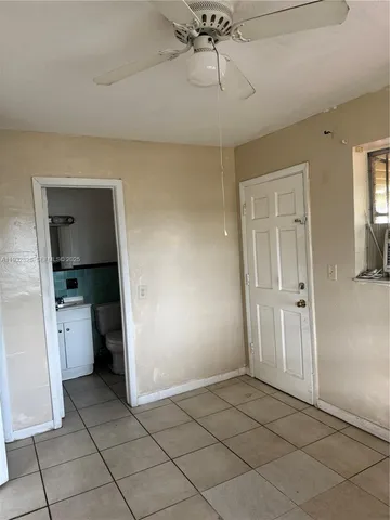 a view of a storage & utility room with closet washer and dryer