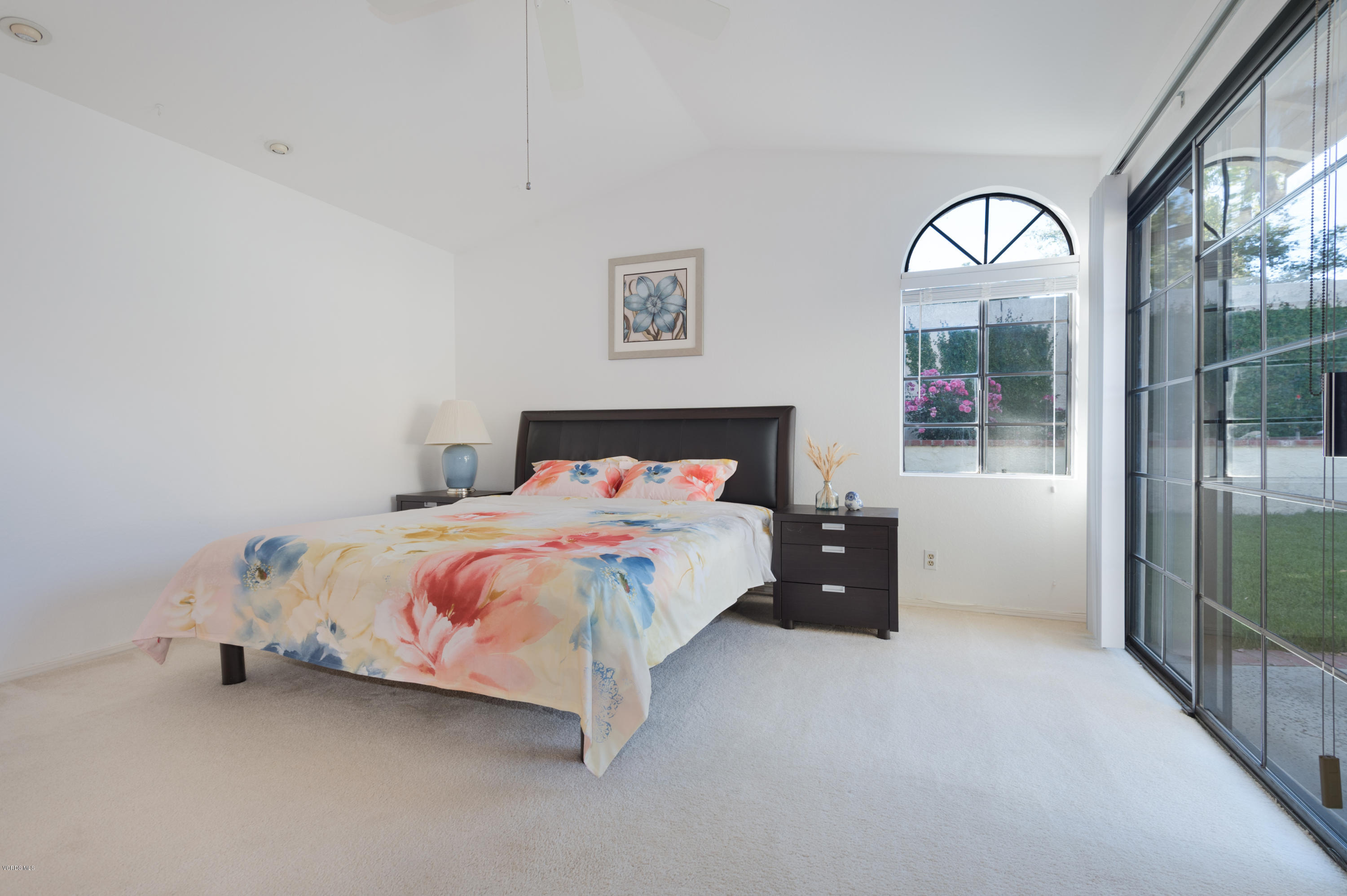 737 Congressional Road Simi Valley, CA 93065 - Photo 13 of 18 a bedroom with a bed and a mirror