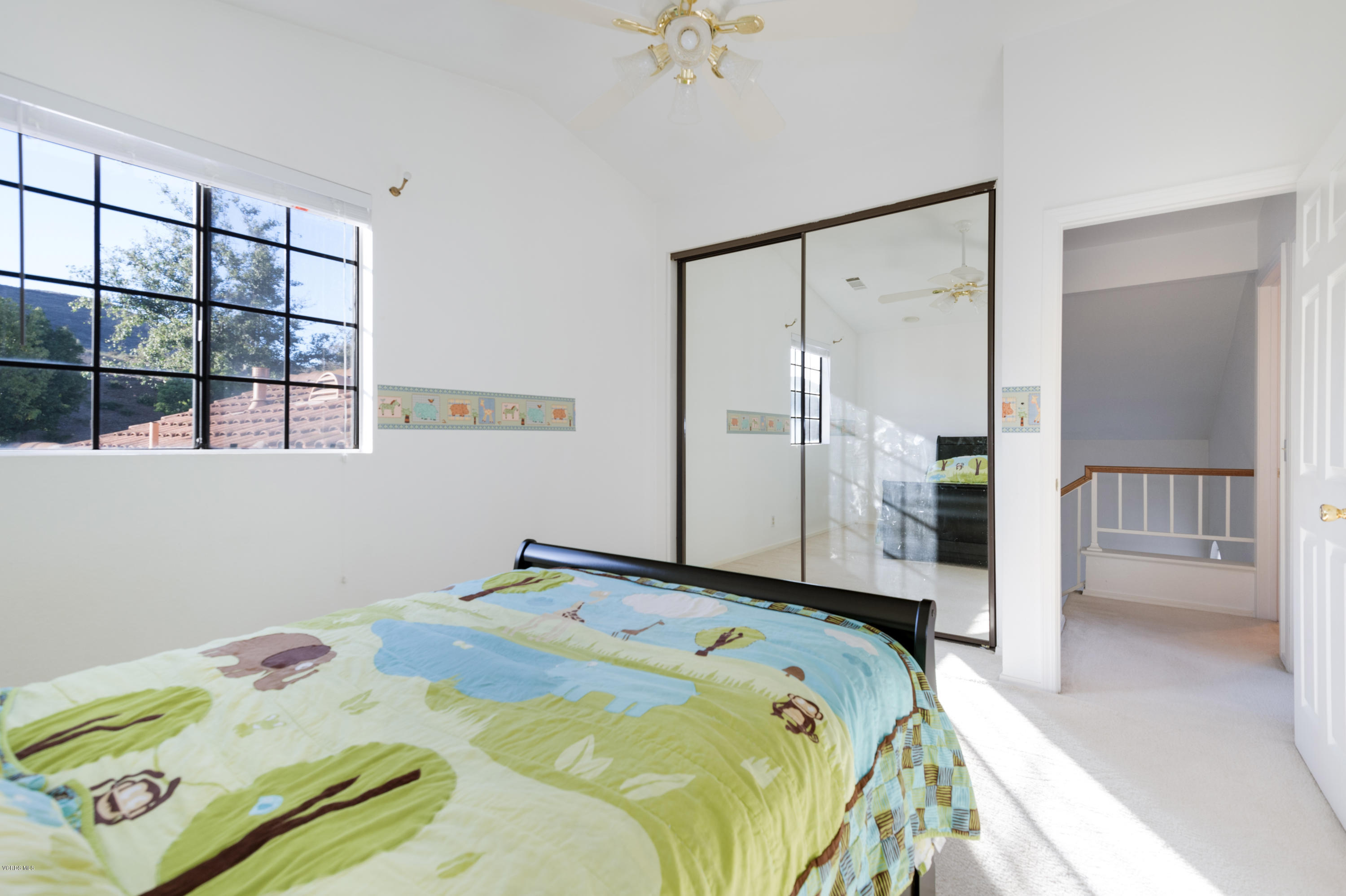 737 Congressional Road Simi Valley, CA 93065 - Photo 14 of 18 a bedroom with a bed and a window