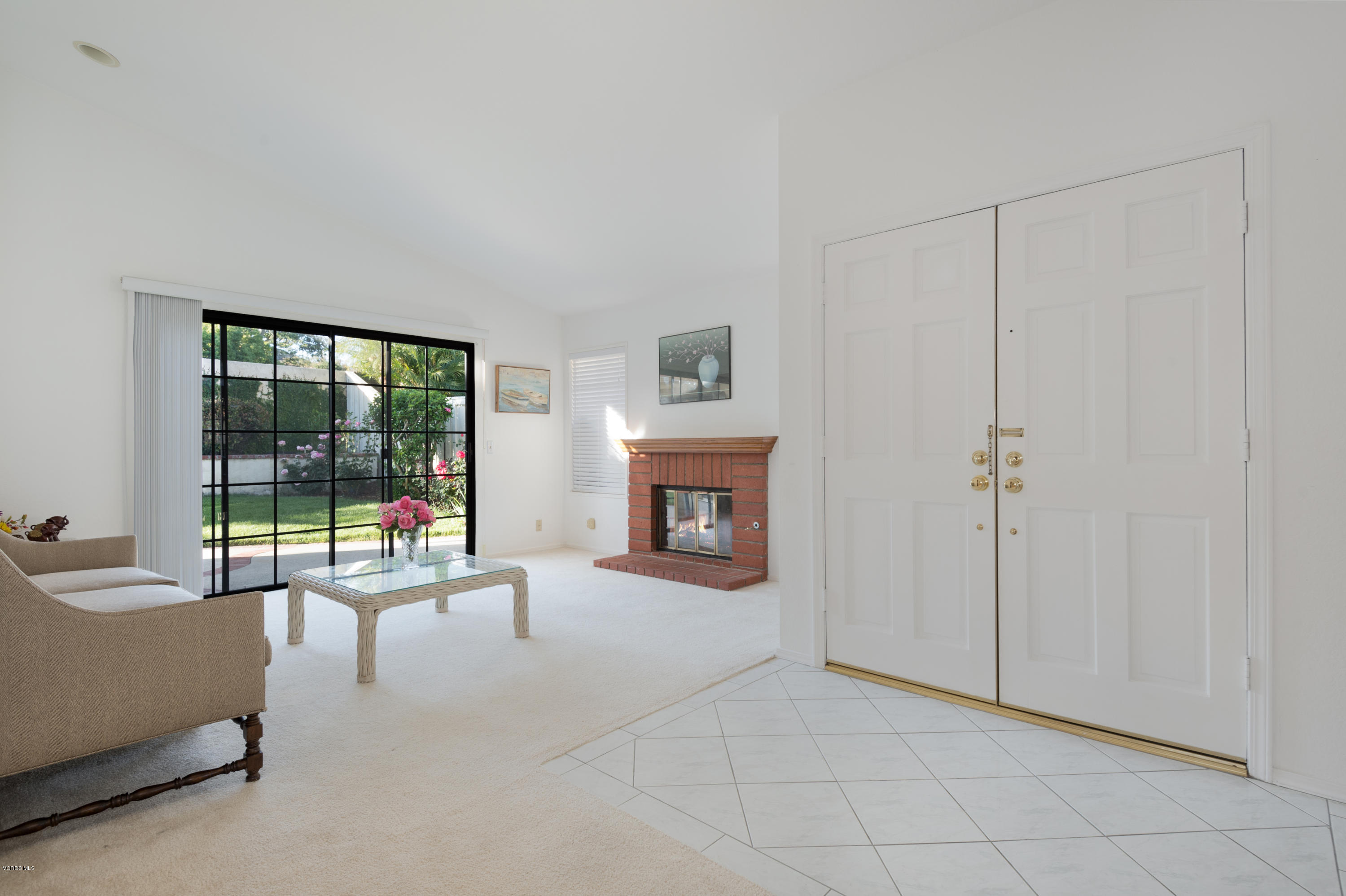 737 Congressional Road Simi Valley, CA 93065 - Photo 6 of 18 a living room with furniture and a fireplace