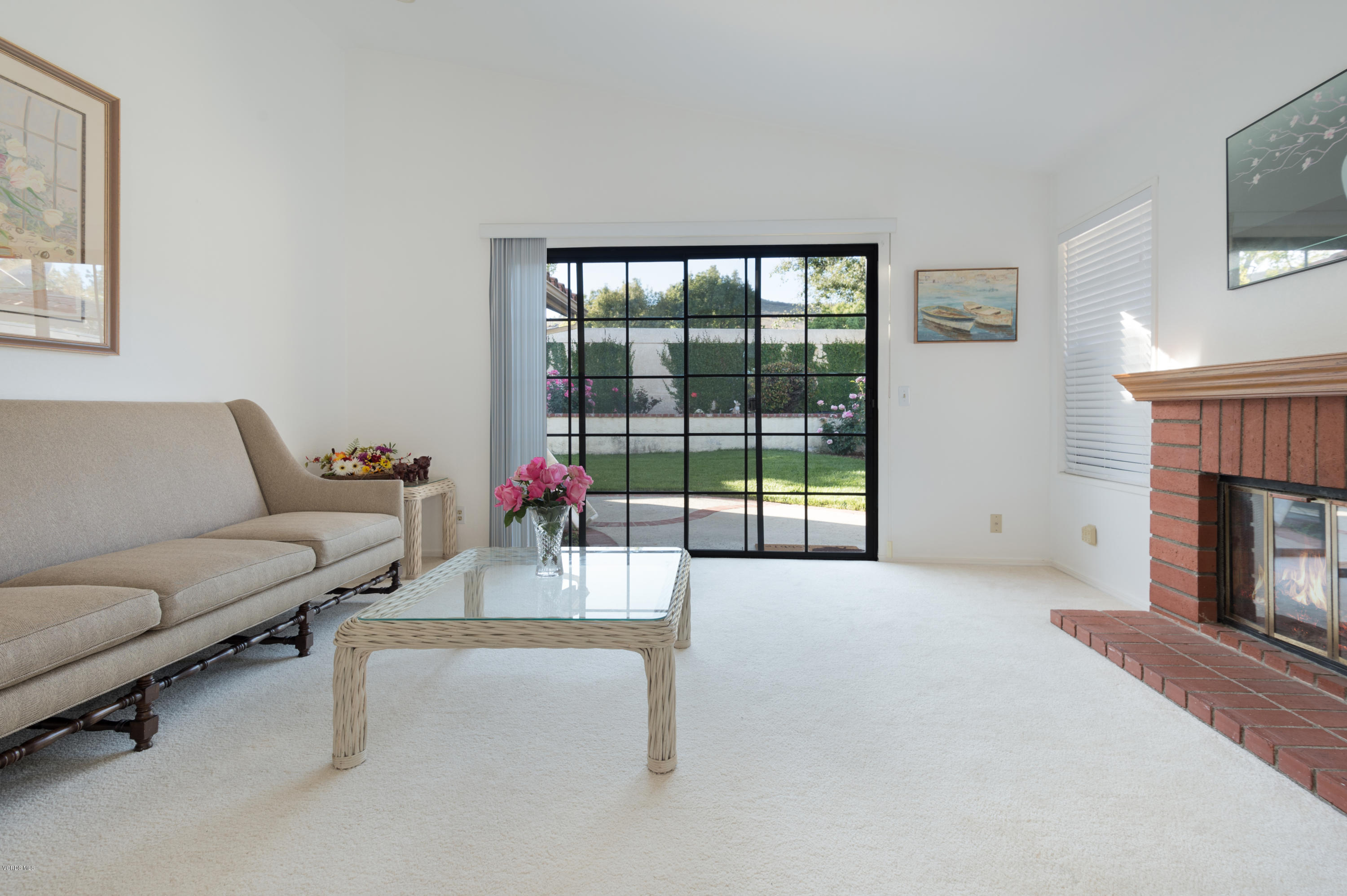 737 Congressional Road Simi Valley, CA 93065 - Photo 8 of 18 a living room with furniture and a fireplace