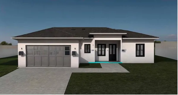 a front view of house with yard and trees