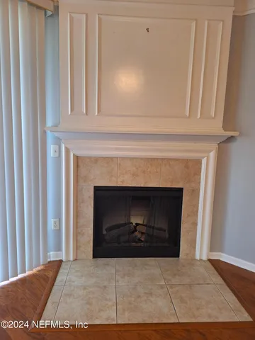 a white toilet sitting next to a white sink
