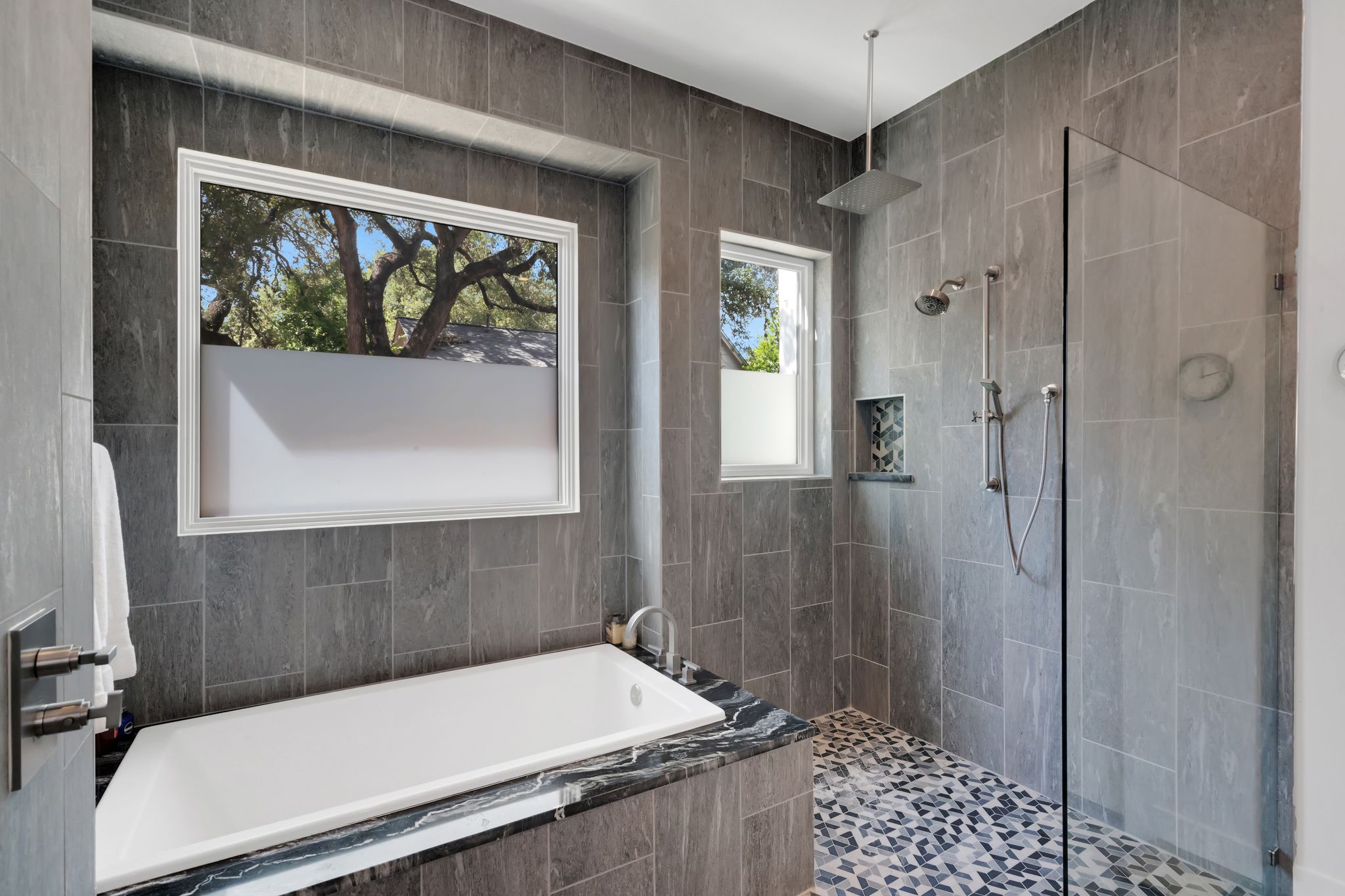 809 Bouldin Avenue Austin, TX 78704 - Photo 13 of 39 Full bath with tiled shower and a garden tub