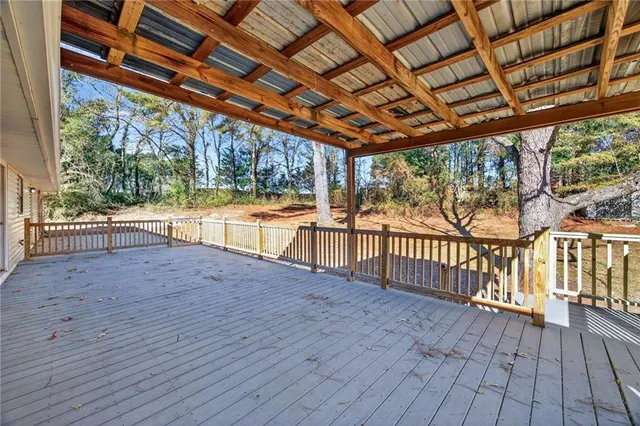a view of porch with wooden floor and outdoor space