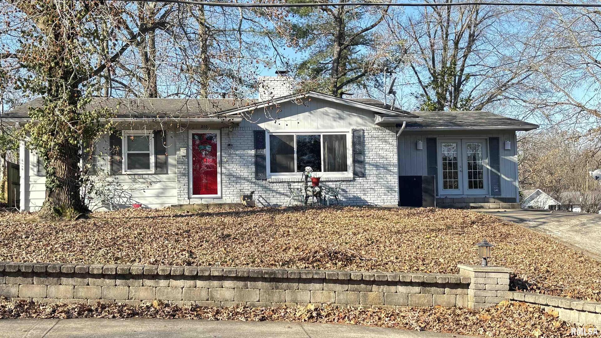 a front view of a house with porch