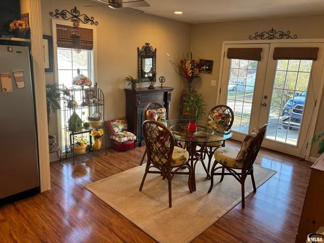 a kitchen with stainless steel appliances a stove a sink and a microwave