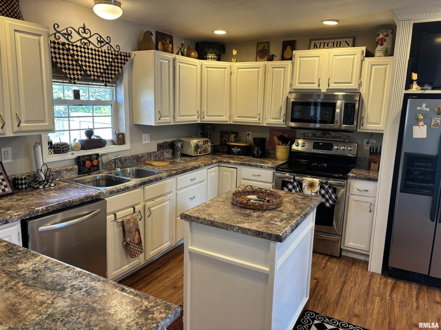210 Apple Lane Anna, IL 62906 - Photo 28 of 45 a kitchen with a sink stove and refrigerator