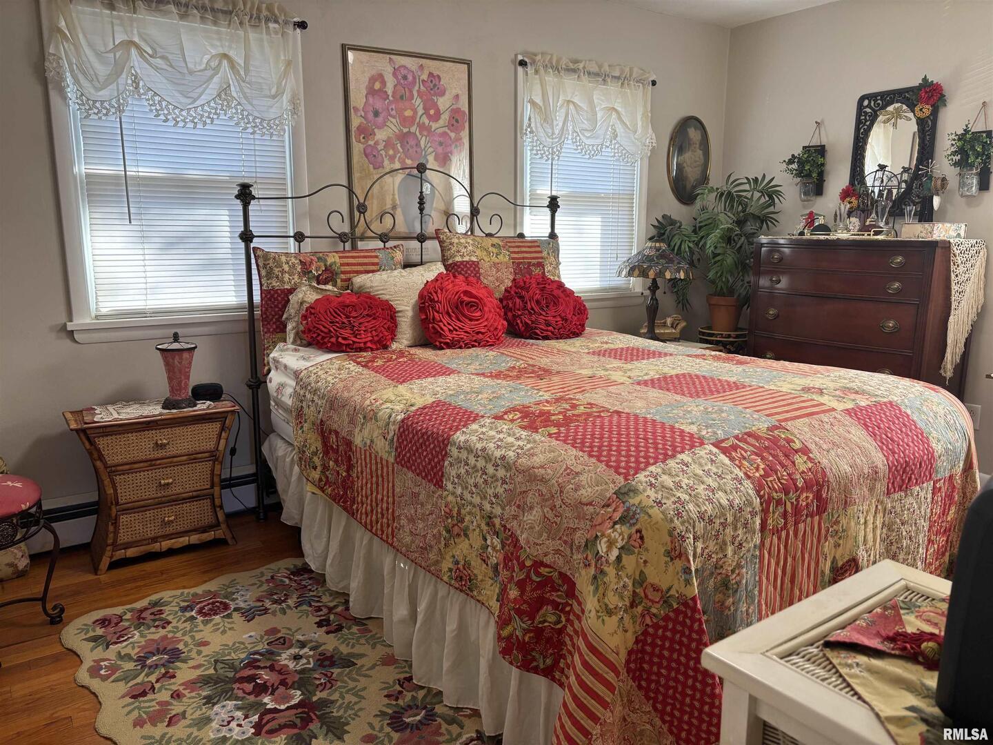 210 Apple Lane Anna, IL 62906 - Photo 29 of 45 a bedroom with bed and wooden floor