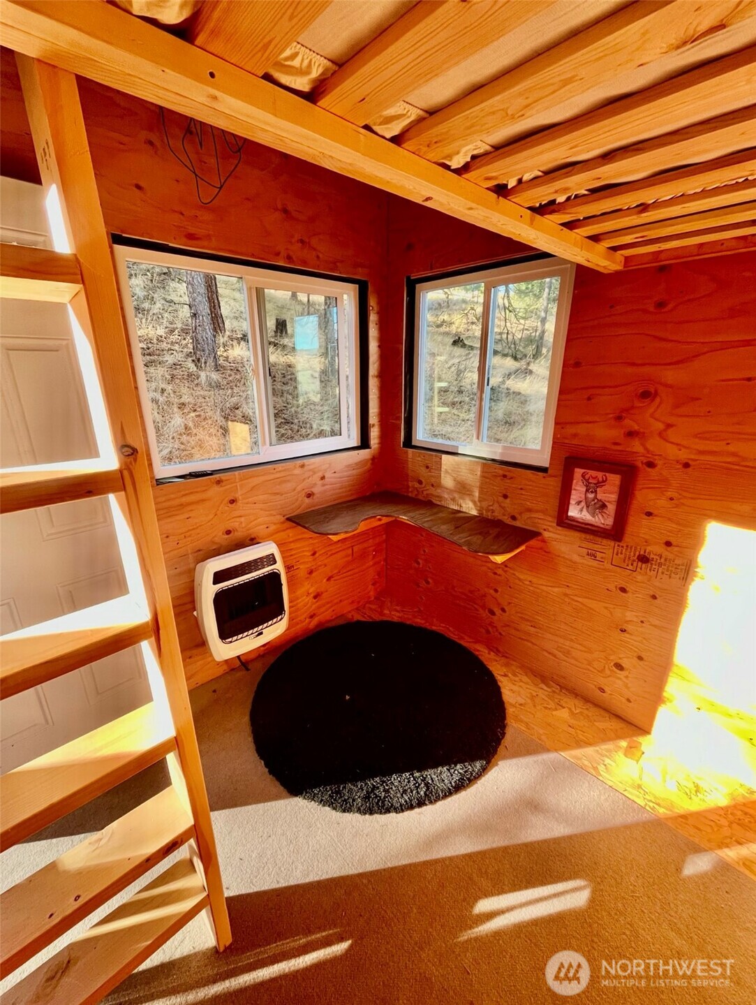 315 Reevas Basin Road Tonasket, WA 98855 - Photo 14 of 25 a view of a fireplace with a sink