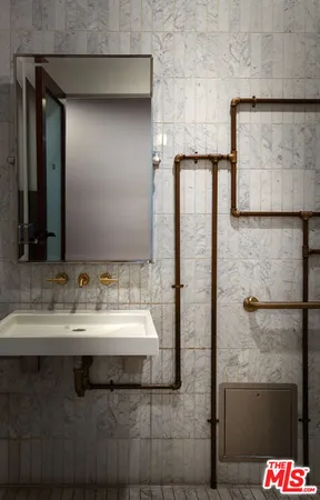 a view of a backyard with table and chairs and potted plants