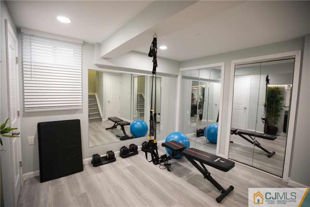 4308 Hana Road Edison, NJ 08817 - Photo 17 of 32 a view of a room with gym equipment