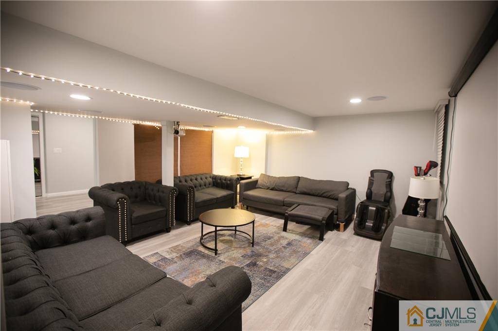 4308 Hana Road Edison, NJ 08817 - Photo 18 of 32 a living room with furniture and a couch