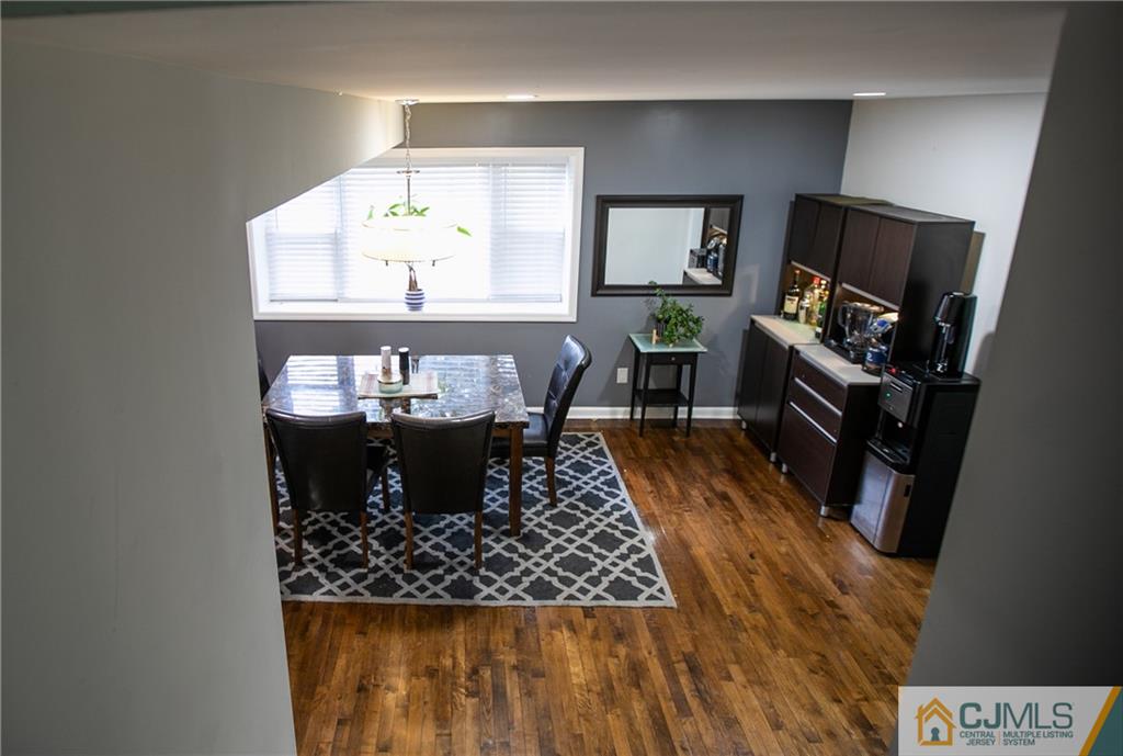 4308 Hana Road Edison, NJ 08817 - Photo 20 of 32 a living room with furniture and a fireplace